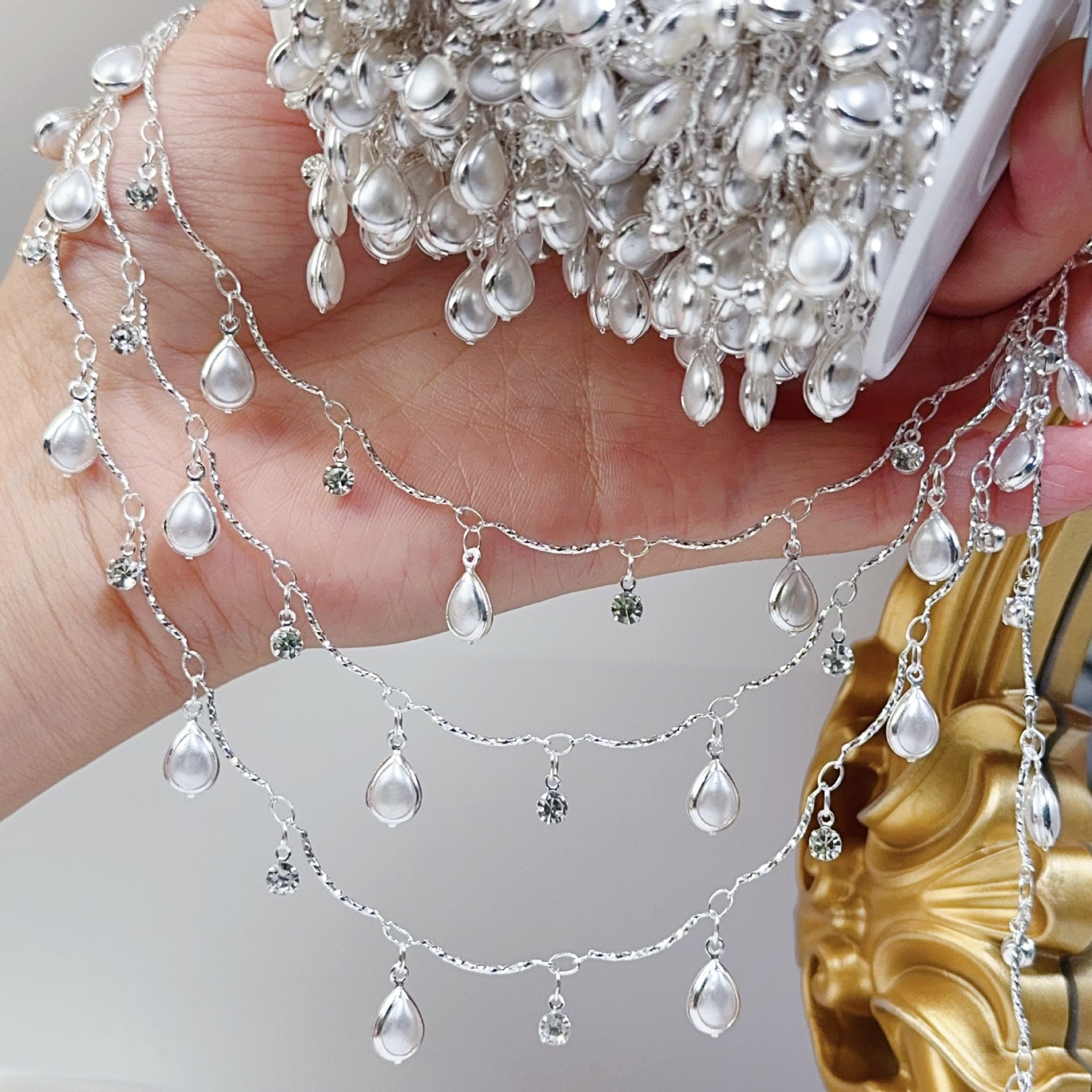 0.5/1/2M Exquisite Curved Stic - مراجعة Pearl Trim Chain وسعره